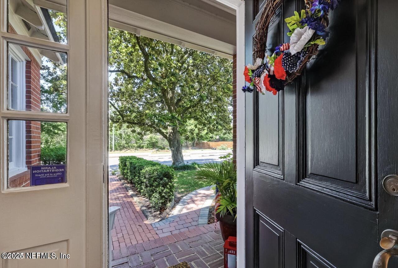 2545 Hendricks Avenue Jacksonville, FL 32207 - Photo 4 of 45 a view of a balcony with flower plants