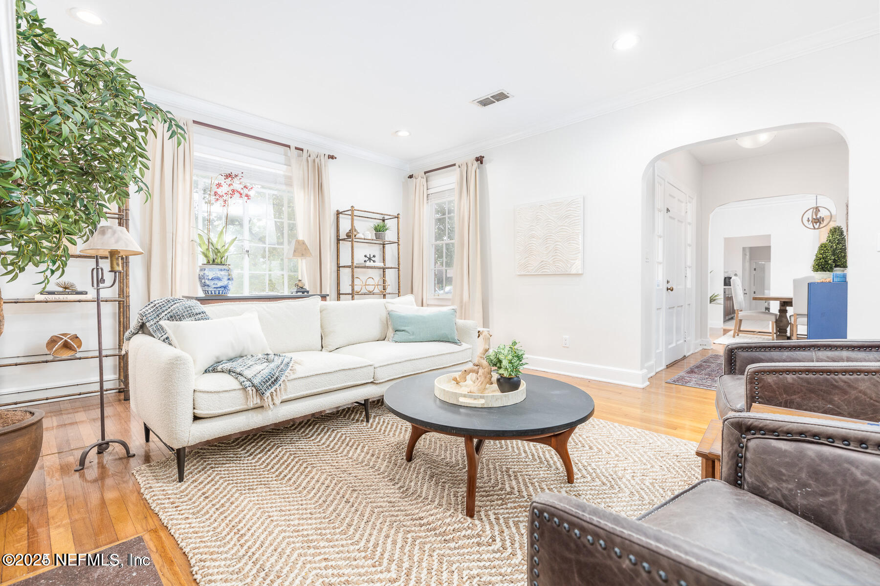 2545 Hendricks Avenue Jacksonville, FL 32207 - Photo 8 of 45 a living room with furniture and a large window