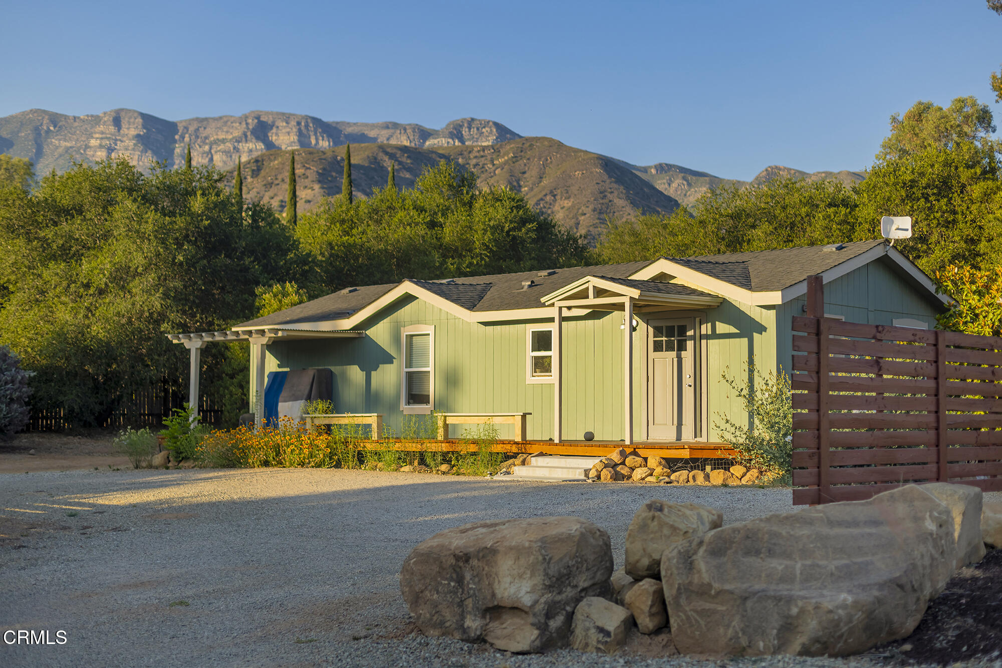 12475 Christmas Tree Road Ojai, CA 93023 - Photo 35 of 50 a front view of a house with a yard and mountain view
