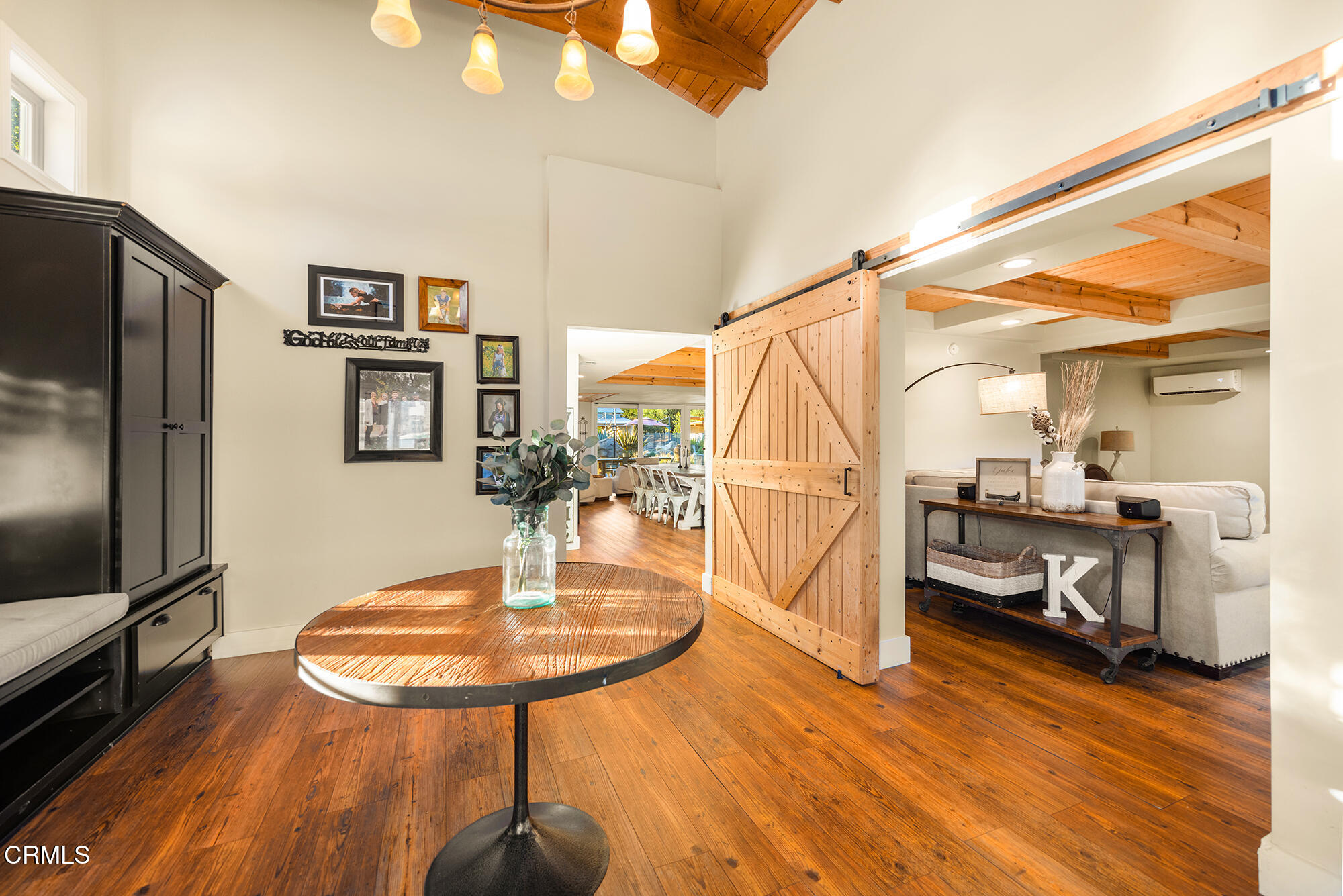12475 Christmas Tree Road Ojai, CA 93023 - Photo 4 of 50 a dining room with furniture a chandelier and wooden floor