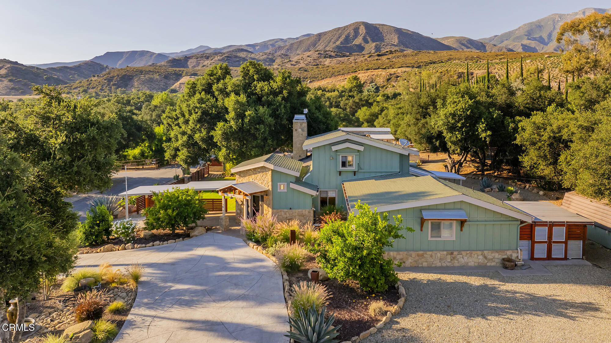 12475 Christmas Tree Road Ojai, CA 93023 - Photo 48 of 50 a front view of a house with a yard and large trees