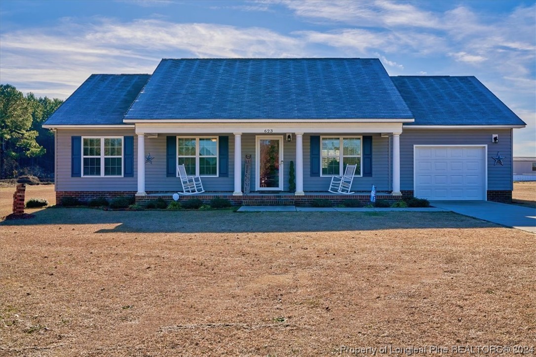 front view of a house with yard
