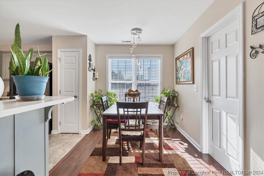 623 Hammonds Road Lumberton, NC 28360 - Photo 17 of 39 a view of a dining room with furniture window and wooden floor