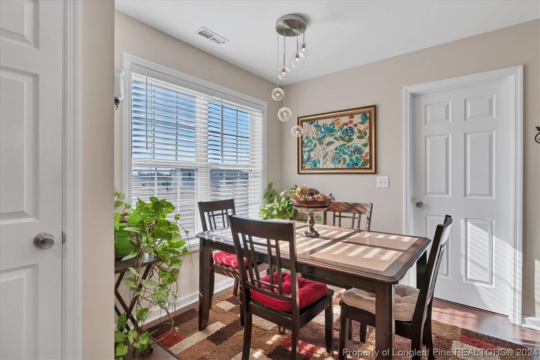 623 Hammonds Road Lumberton, NC 28360 - Photo 20 of 39 a view of a dining room with furniture window and wooden floor