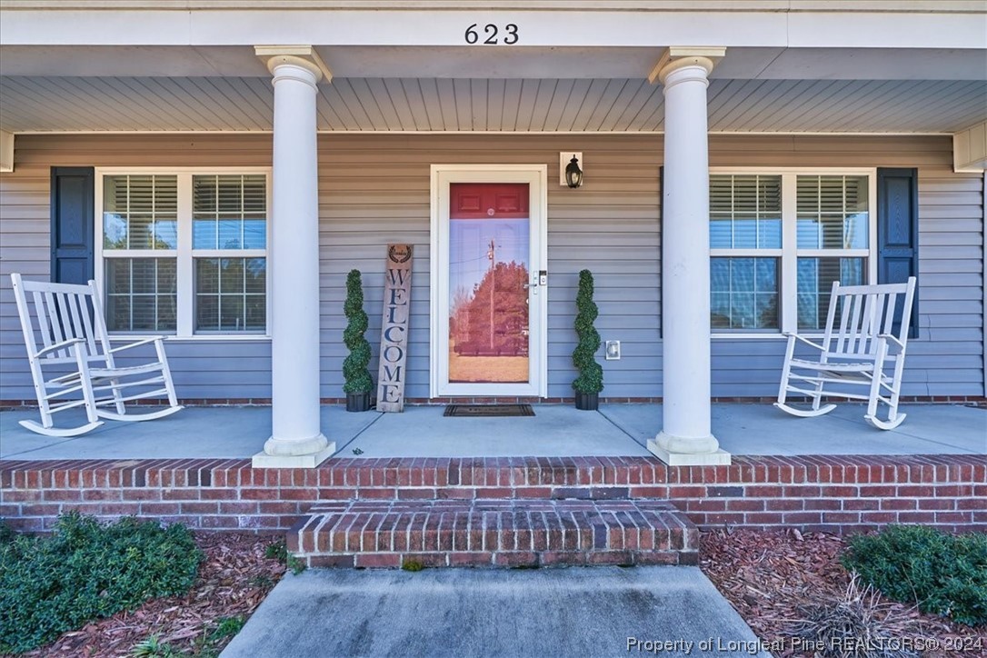 623 Hammonds Road Lumberton, NC 28360 - Photo 2 of 39 a view of front door of house with outdoor seating