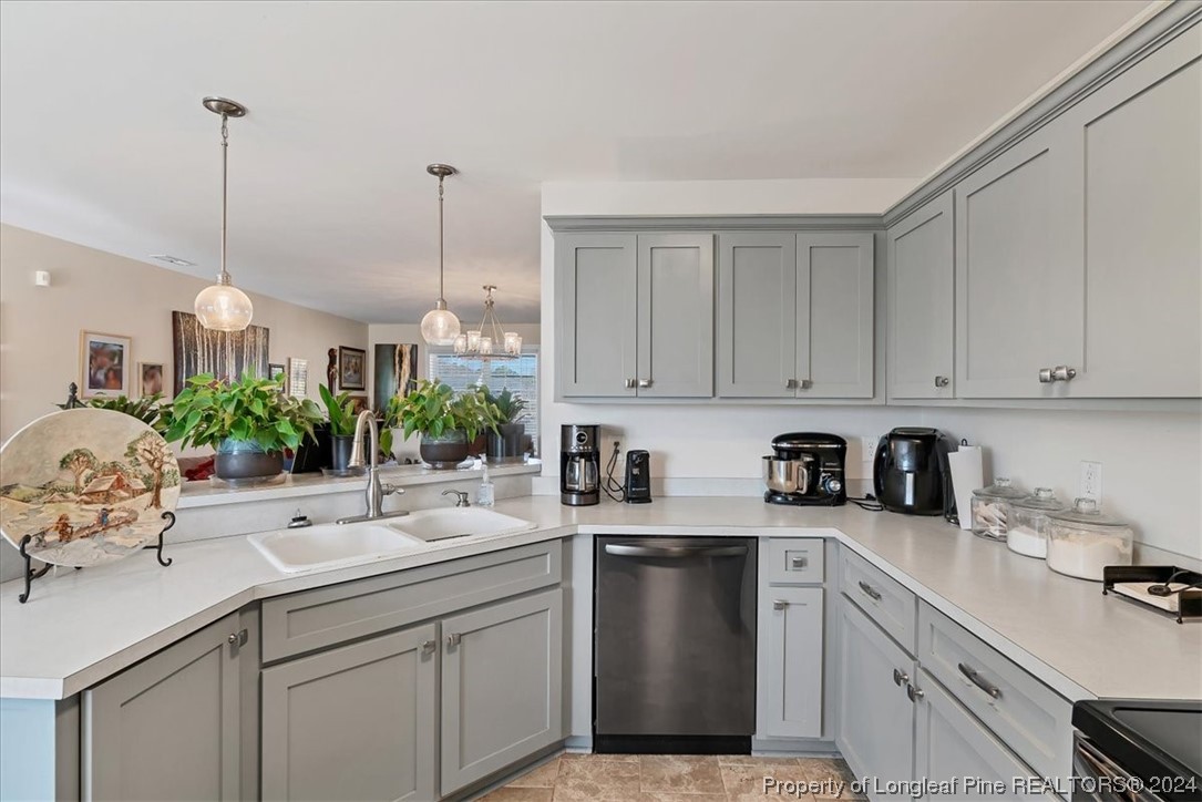 623 Hammonds Road Lumberton, NC 28360 - Photo 22 of 39 a kitchen with a sink and cabinets