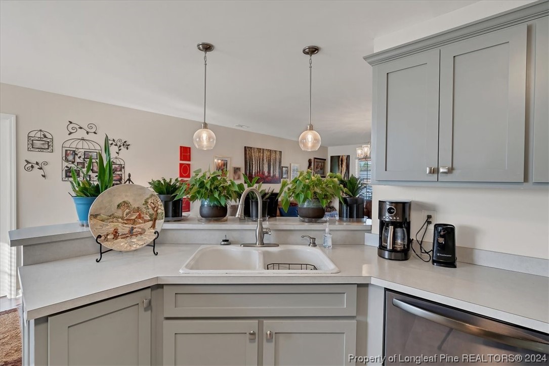 623 Hammonds Road Lumberton, NC 28360 - Photo 23 of 39 a kitchen with a sink and cabinets