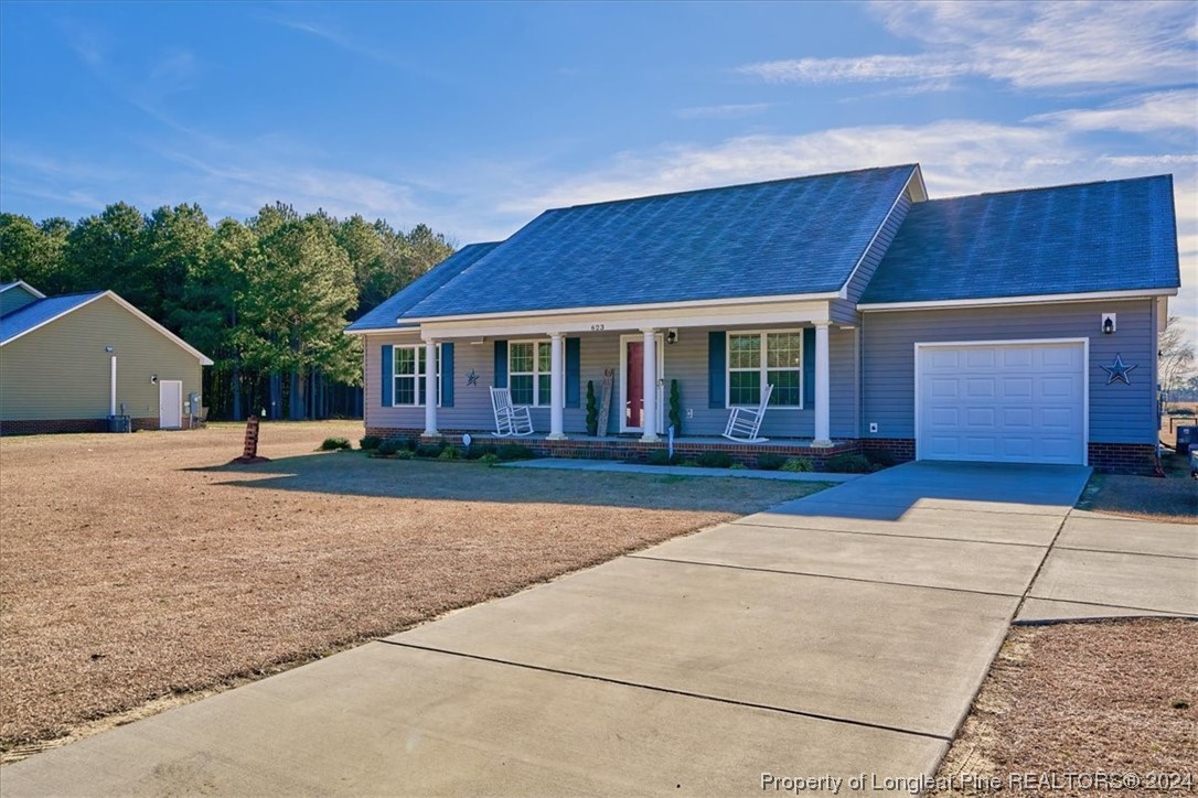 623 Hammonds Road Lumberton, NC 28360 - Photo 5 of 39 front view of a house with a yard