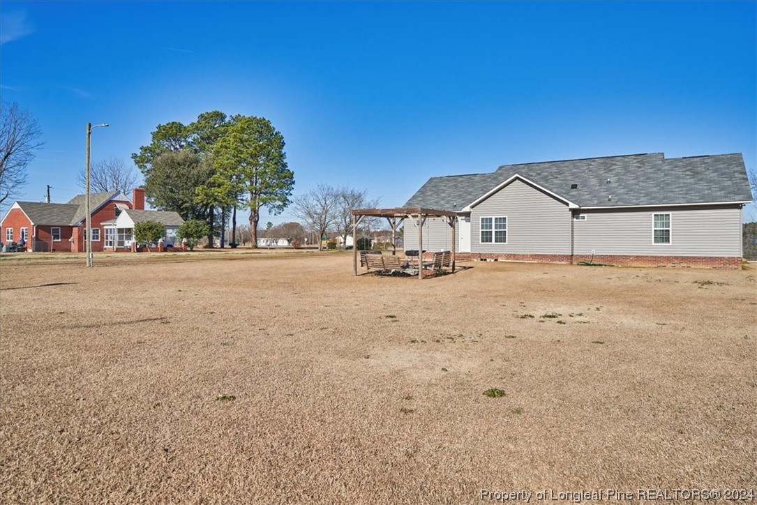 623 Hammonds Road Lumberton, NC 28360 - Photo 7 of 39 a view of a house with a outdoor space