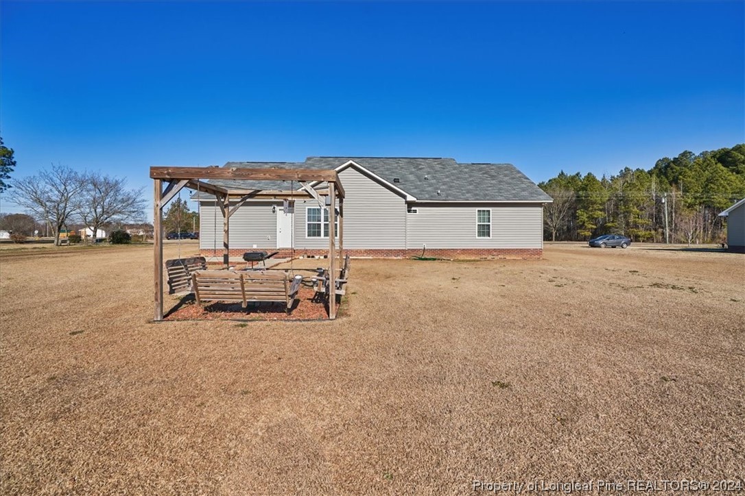 623 Hammonds Road Lumberton, NC 28360 - Photo 8 of 39 a view of a house with a yard