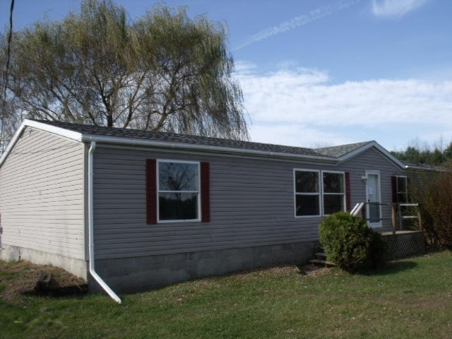 4251 South Adams Road Ravenna, MI 49451 - Photo 1 of 15 front 1
