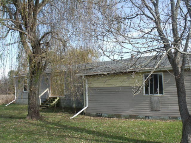 4251 South Adams Road Ravenna, MI 49451 - Photo 15 of 15 rear