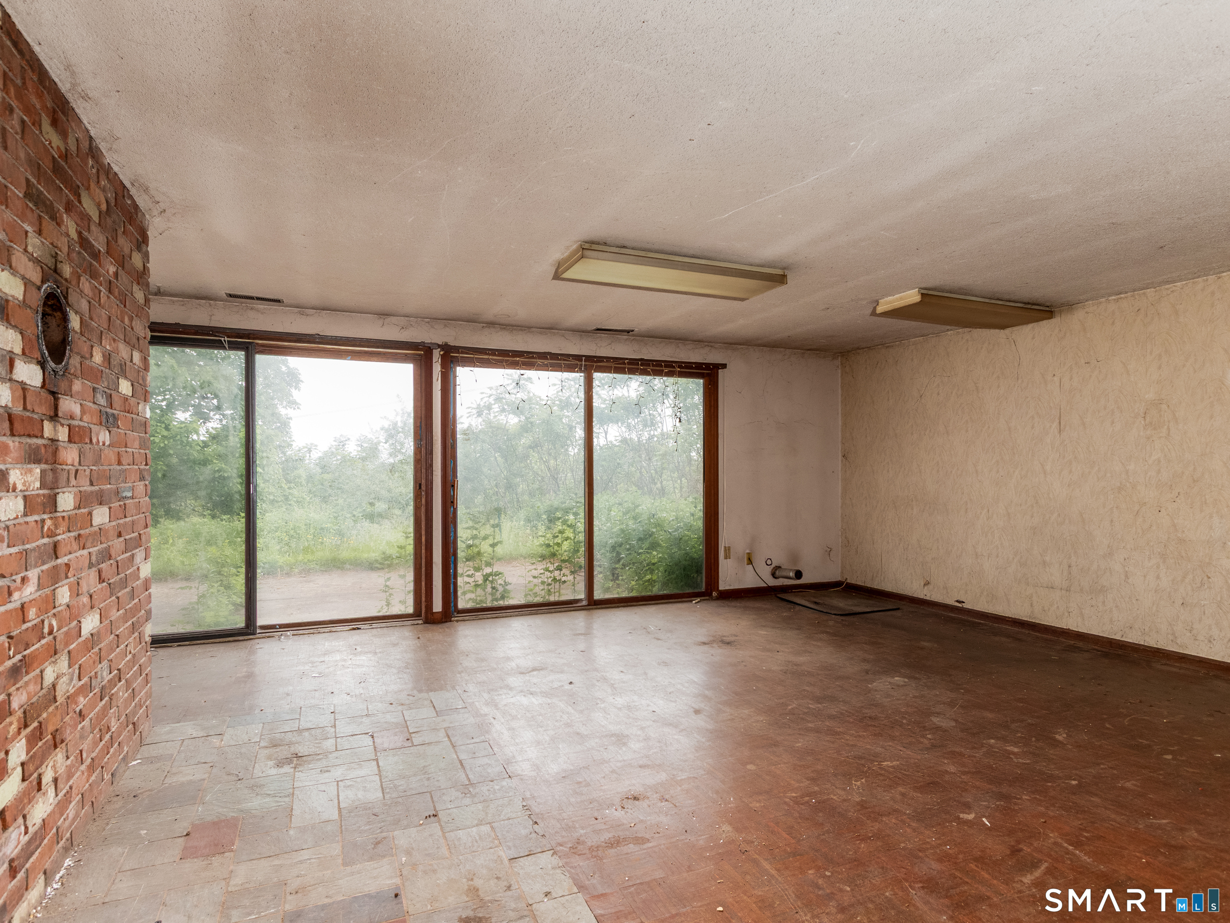 63 High Hill Road Wallingford, CT 06492 - Photo 30 of 34 a view of an empty room with a large window