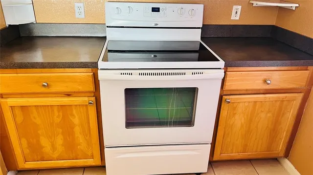 a bathroom with a tub and shower