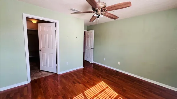 a bathroom with a sink toilet and mirror