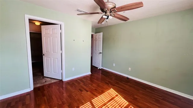 a bathroom with a sink toilet and mirror