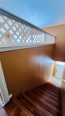 a view of a living room with hardwood floor