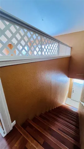 a view of a living room with hardwood floor