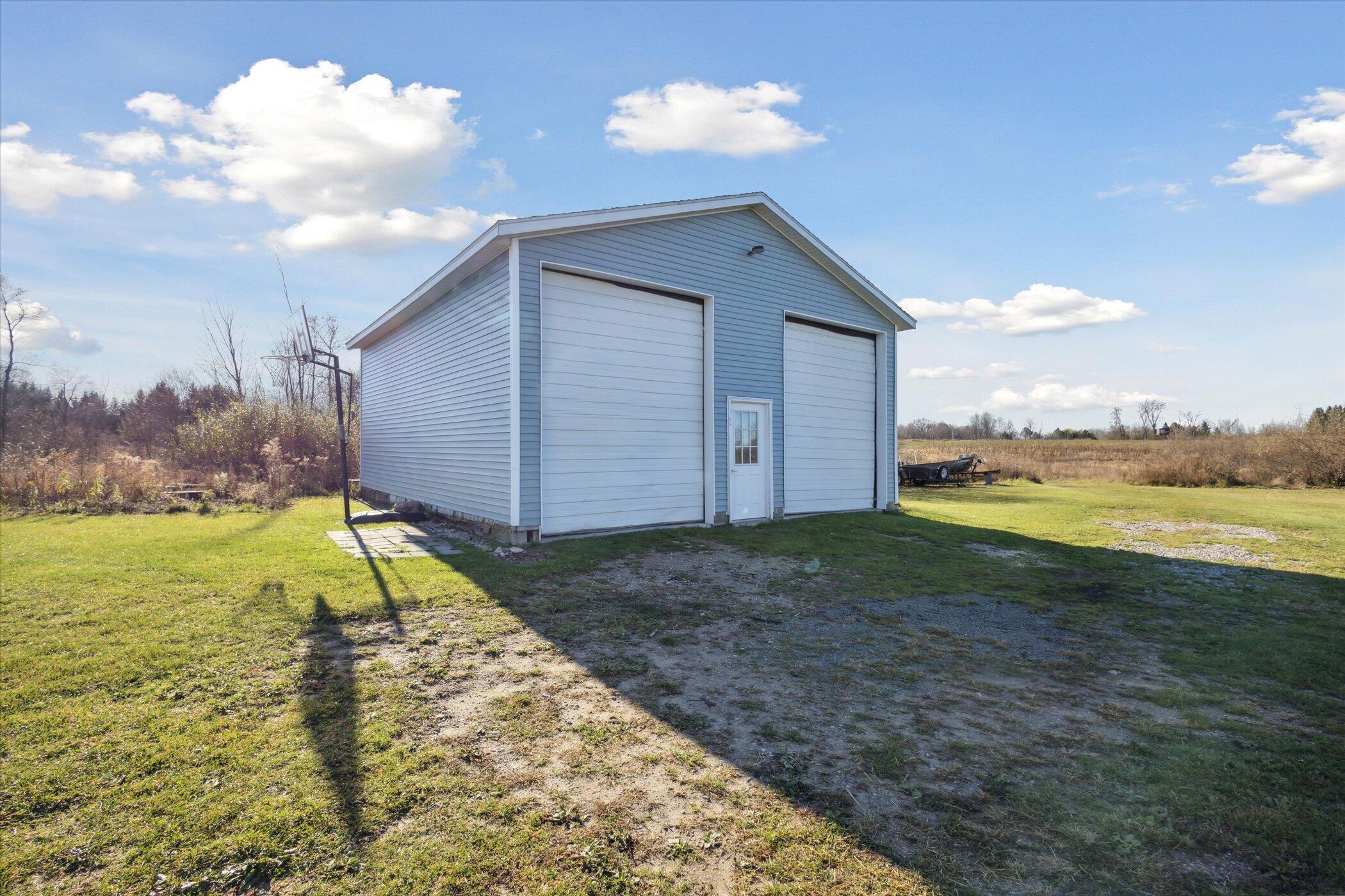8231 Derby Road Six Lakes, MI 48886 - Photo 52 of 66 52-8231-Derby-Rd-Six-Lakes-MI-48886-Wind