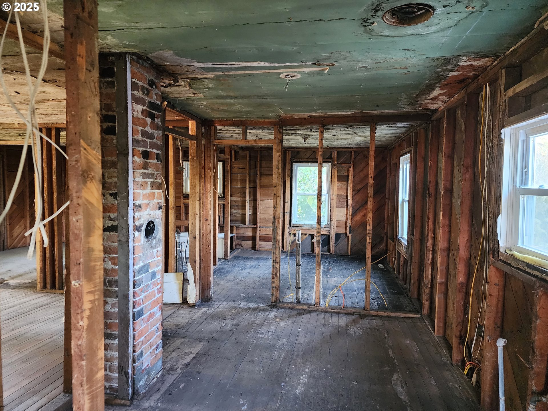 625 Baltimore Street Elgin, OR 97827 - Photo 14 of 17 a view of a room with wooden walls
