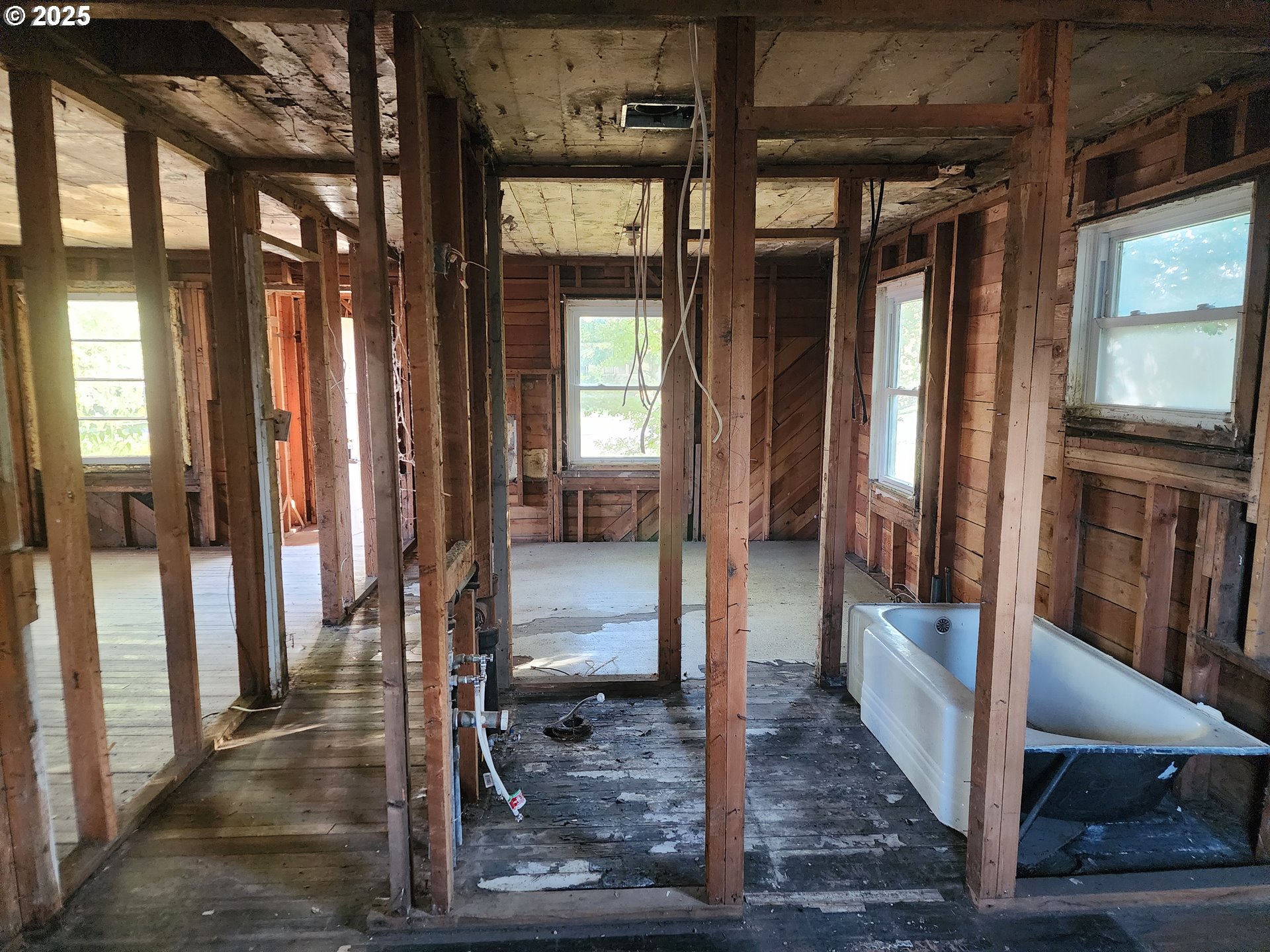 625 Baltimore Street Elgin, OR 97827 - Photo 10 of 17 a view of a hallway with wooden floor and staircase