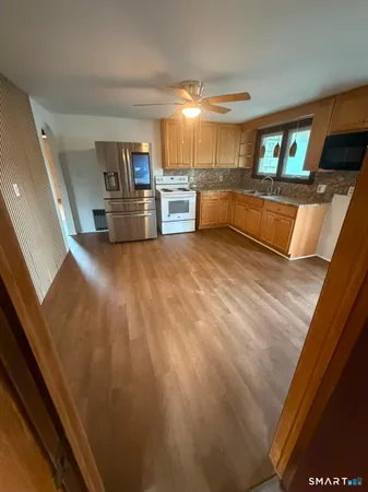 a view of a kitchen with a sink