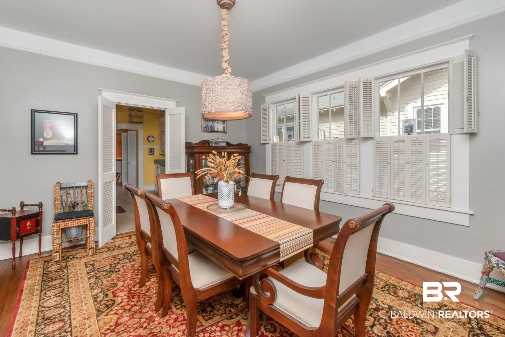 135 Silverwood Street Mobile, AL 36607 - Photo 6 of 32 Dining space with wood finished floors and baseboards