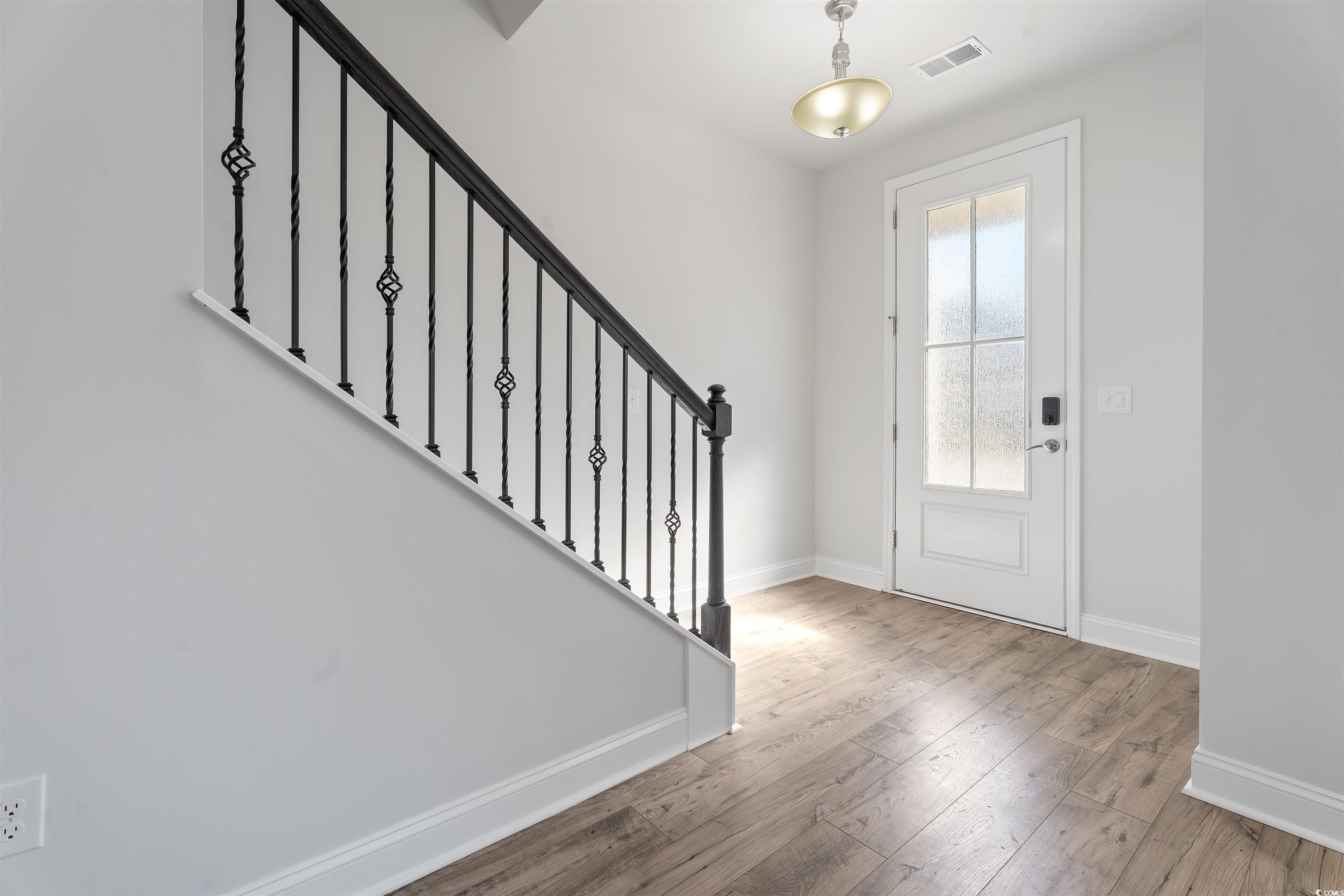 227 Walnut Grove Myrtle Beach, SC 29579 - Photo 3 of 28 Entrance foyer with wood-type flooring