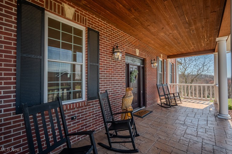 434 Rector Road Parkersburg, WV 26104 - Photo 14 of 50 View of patio with covered porch