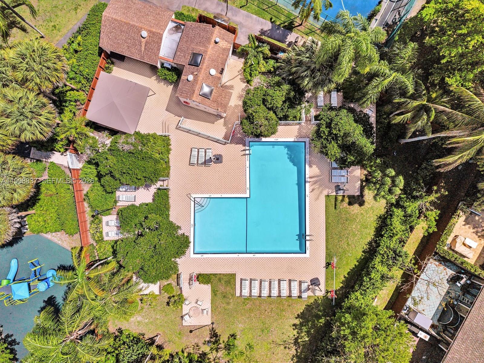 13406 Southwest 102nd Lane Miami, FL 33186 - Photo 39 of 47 an aerial view of a house with a garden