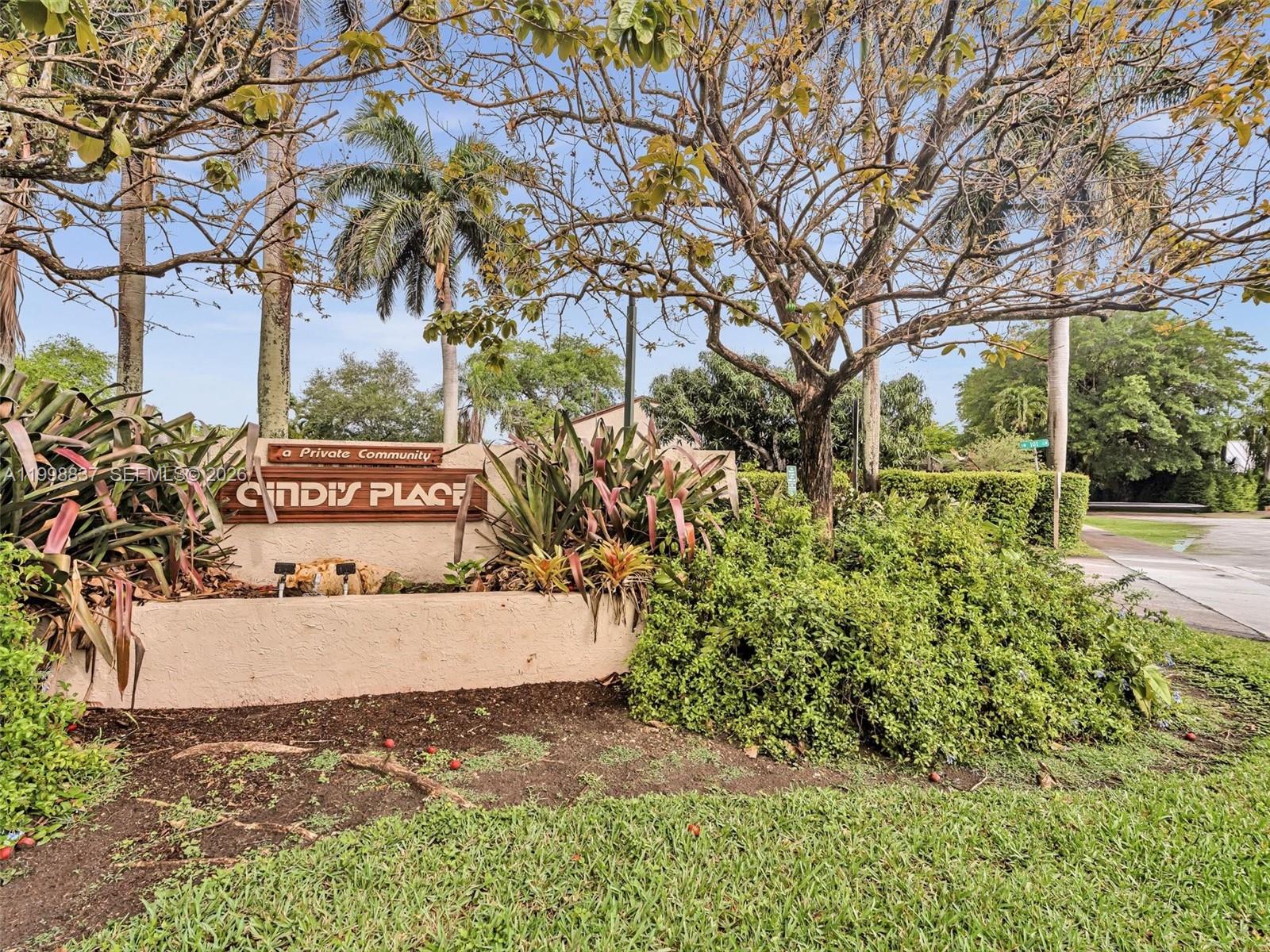 13406 Southwest 102nd Lane Miami, FL 33186 - Photo 45 of 47 a view of a street with a building