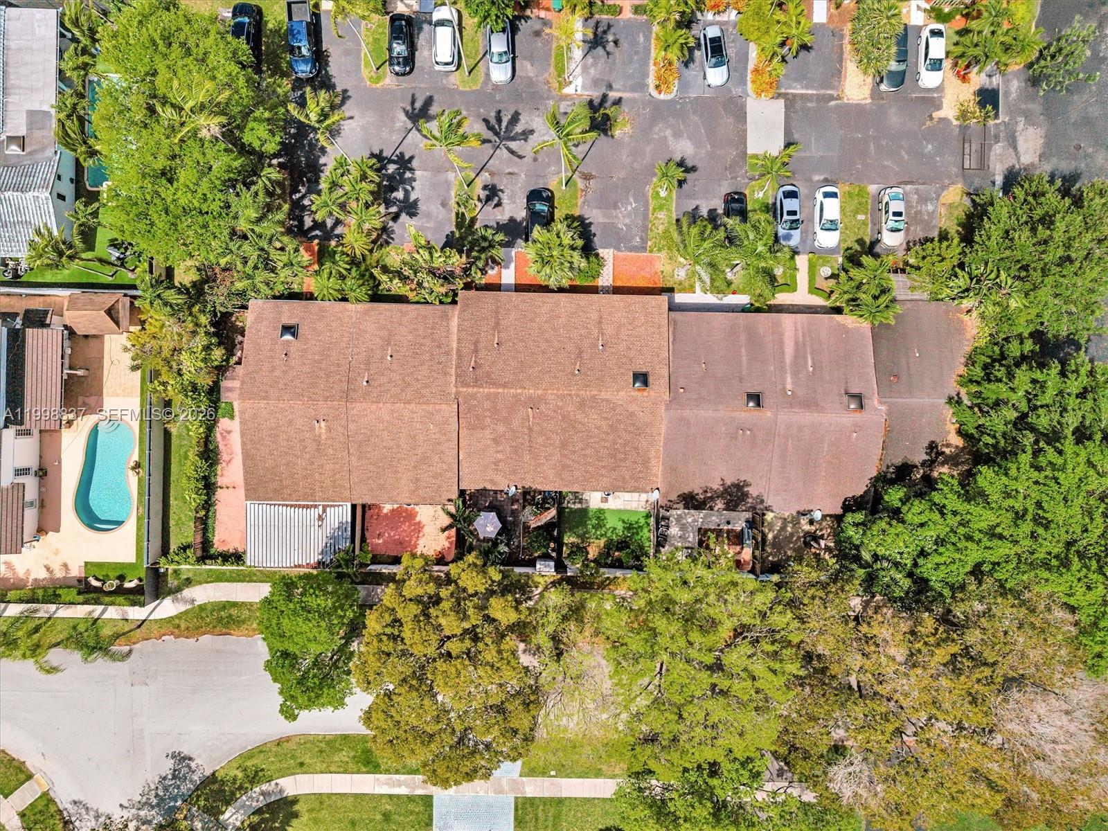 13406 Southwest 102nd Lane Miami, FL 33186 - Photo 6 of 47 front view of a house with a yard