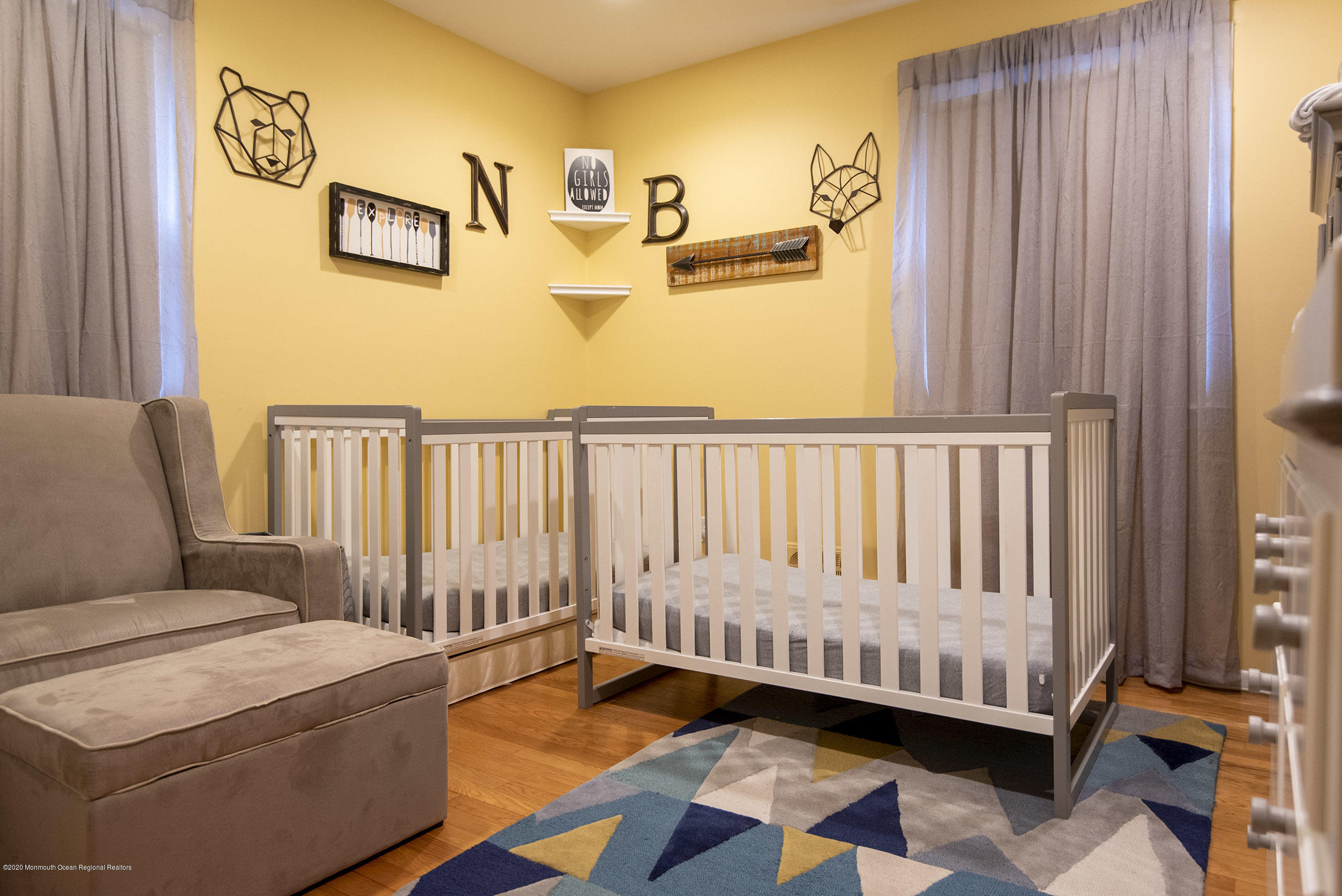 564 Nicholas Road Brick, NJ 08724 - Photo 17 of 22 a living room with baby crib furniture and a window