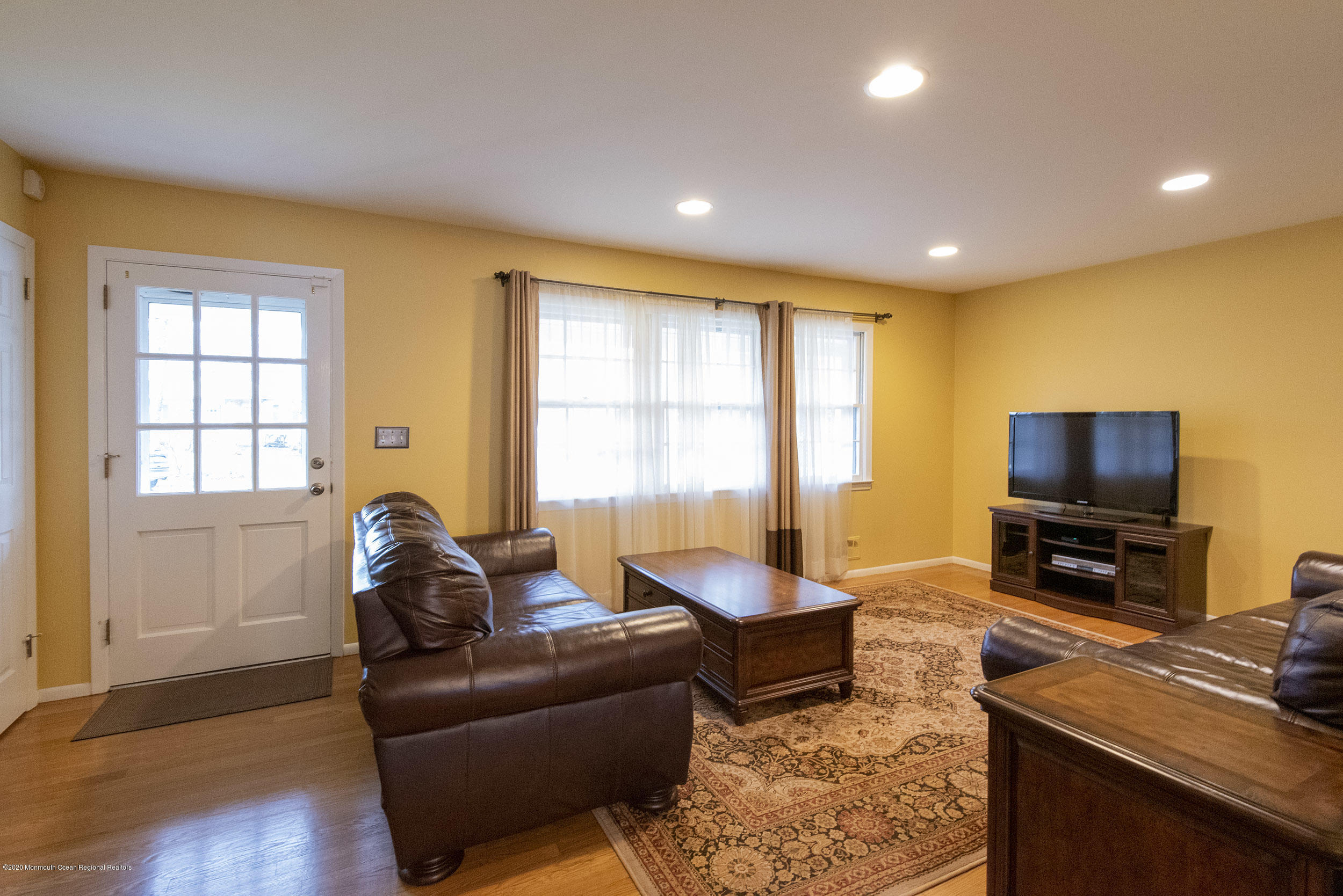 564 Nicholas Road Brick, NJ 08724 - Photo 3 of 22 a living room with furniture and a flat screen tv