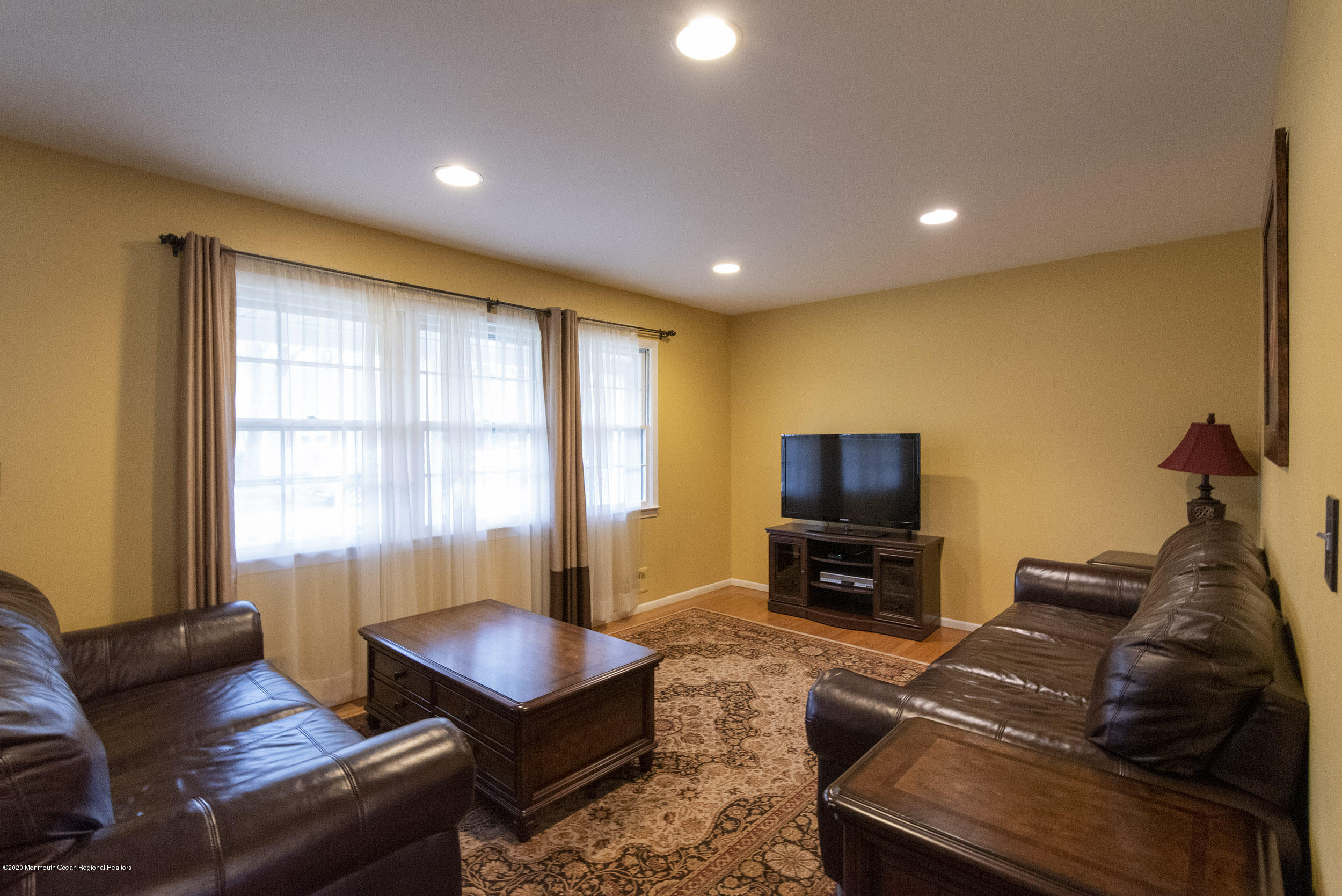 564 Nicholas Road Brick, NJ 08724 - Photo 5 of 22 a living room with furniture and a flat screen tv