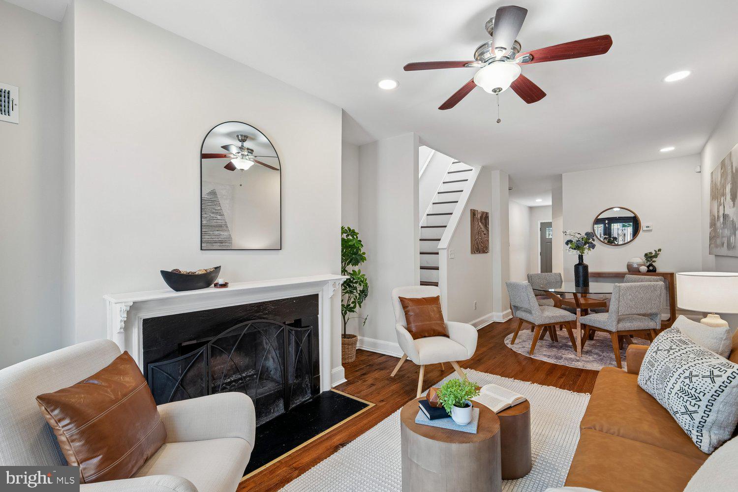 1652 Kramer Street Northeast Washington, DC 20002 - Photo 12 of 26 a living room with furniture and a fireplace
