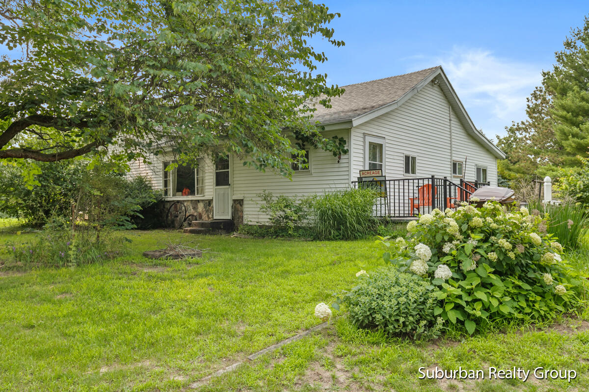 1569 South Sheridan Road Stanton, MI 48888 - Photo 1 of 29 img_1002