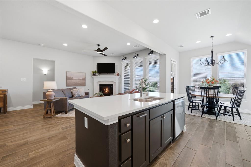 1121 Bantham Way Forney, TX 75126 - Photo 11 of 28 Oversized kitchen island with additional seating.