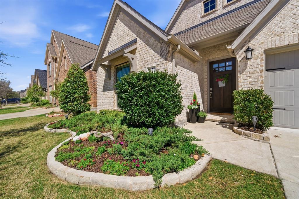 1121 Bantham Way Forney, TX 75126 - Photo 3 of 28 Beautiful mahogany front door with timeless curb appeal.