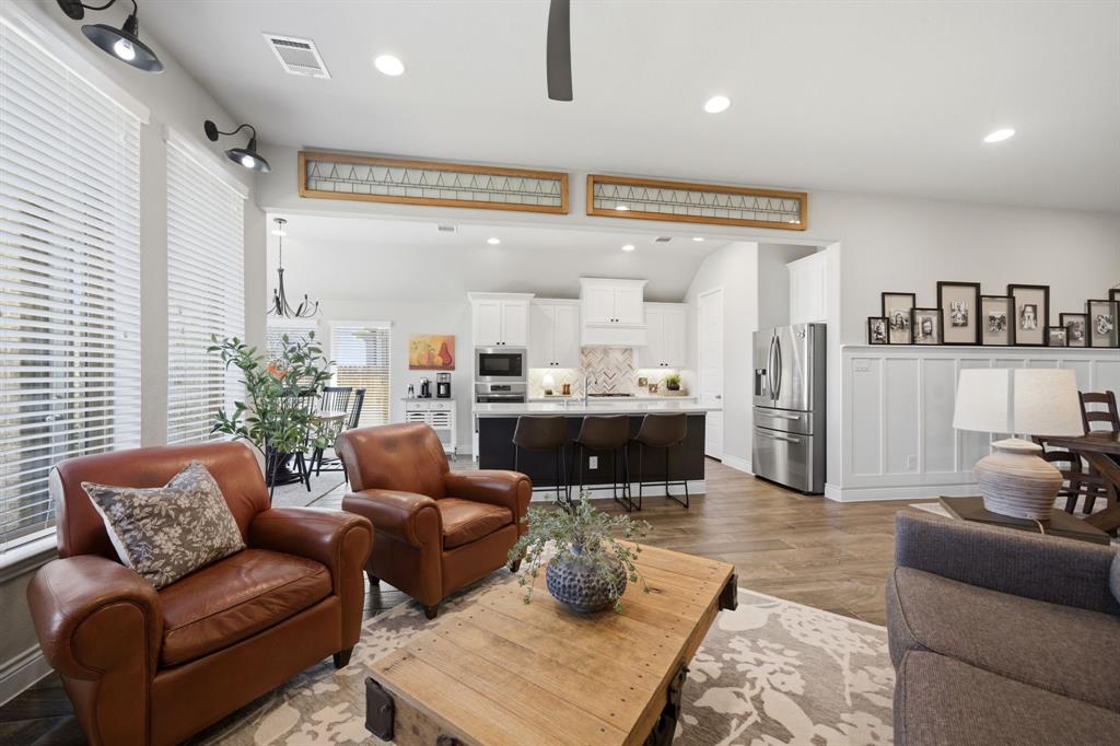 1121 Bantham Way Forney, TX 75126 - Photo 9 of 28 Open concept looking into the kitchen.
