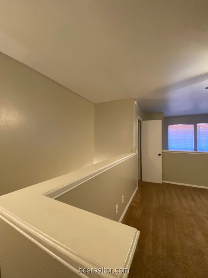 1305 West Villa Maria Road, Unit B106 Bryan, TX 77801 - Photo 8 of 14 a view of an empty room
