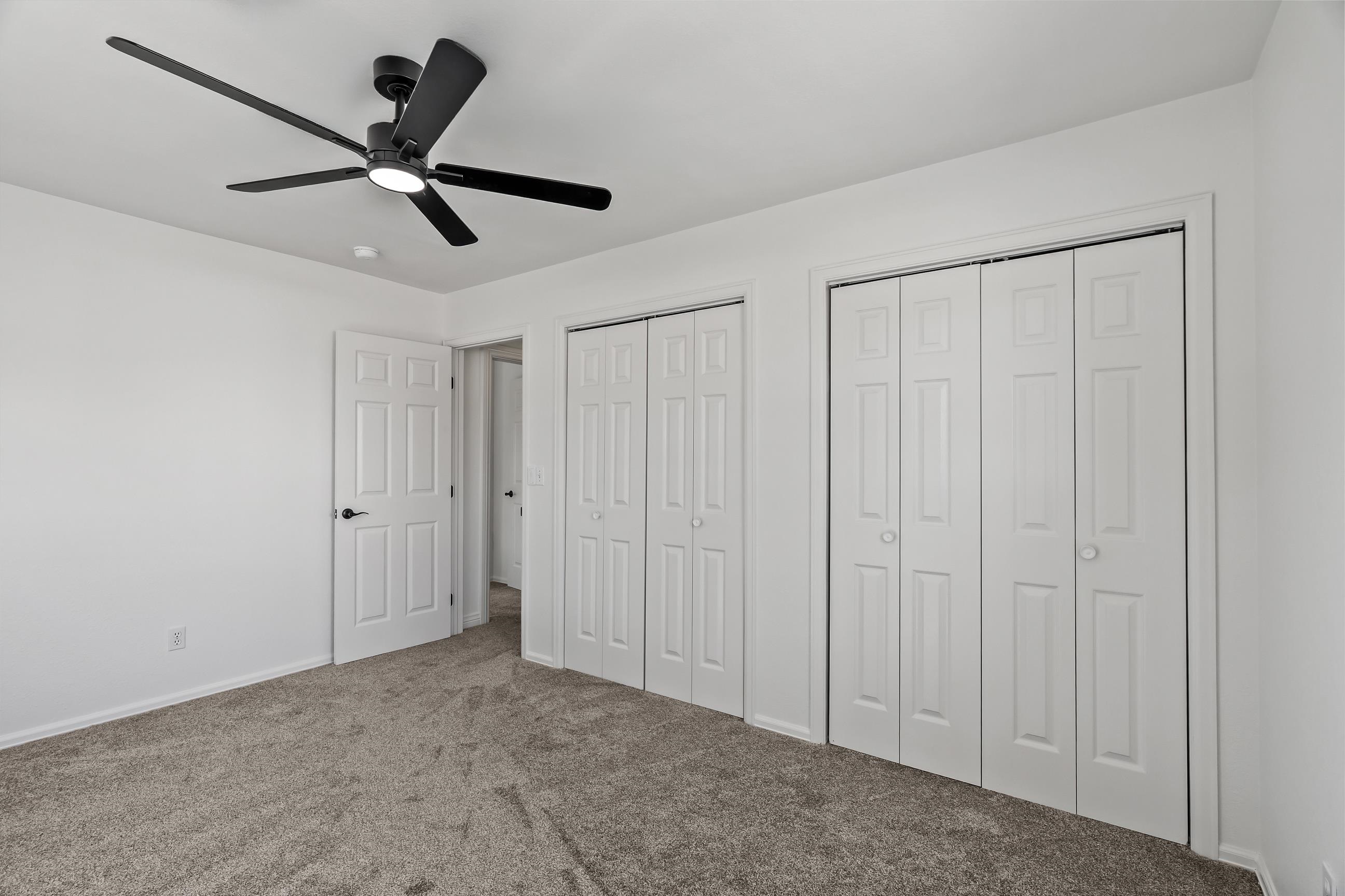 705-24 24 3/4 Road Grand Junction, CO 81505 - Photo 14 of 27 a view of a livingroom with a ceiling fan