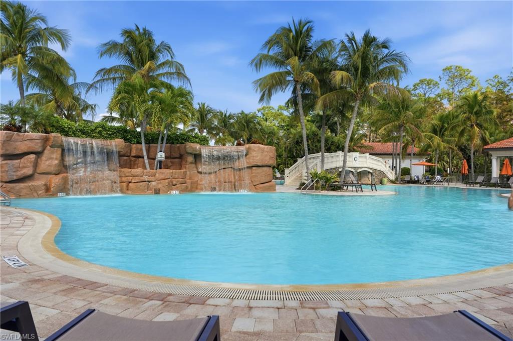 9528 Avellino Way, Unit 2521 Naples, FL 34113 - Photo 22 of 41 a view of a swimming pool with a patio