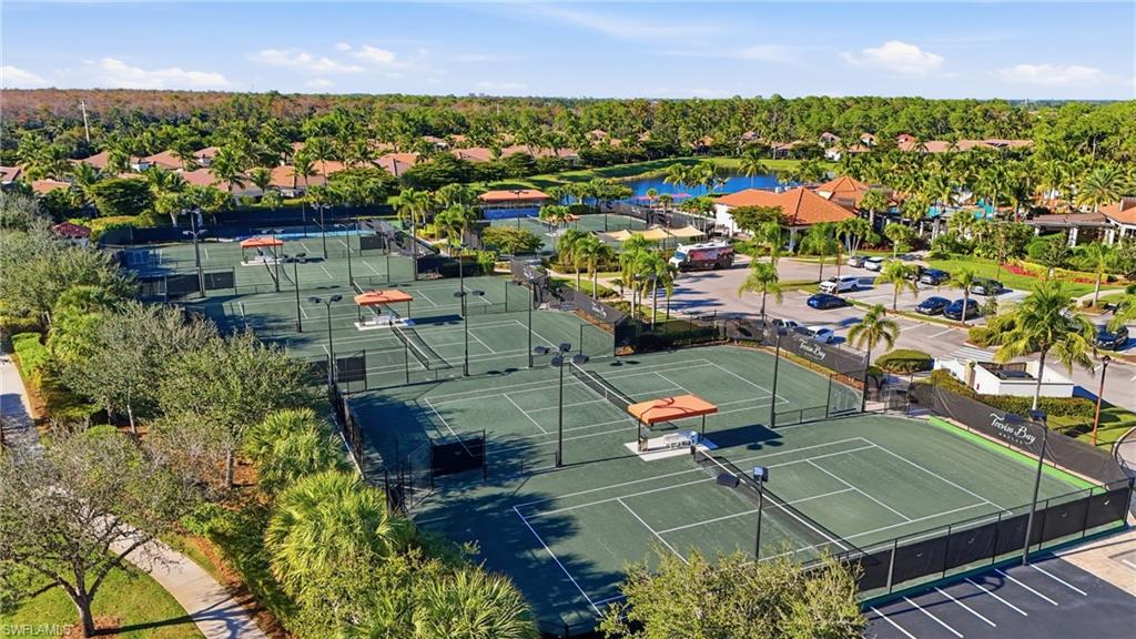 9528 Avellino Way, Unit 2521 Naples, FL 34113 - Photo 40 of 41 an aerial view of a houses with a city view