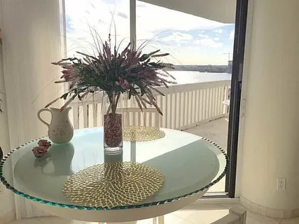 a vase of flowers sitting on a table