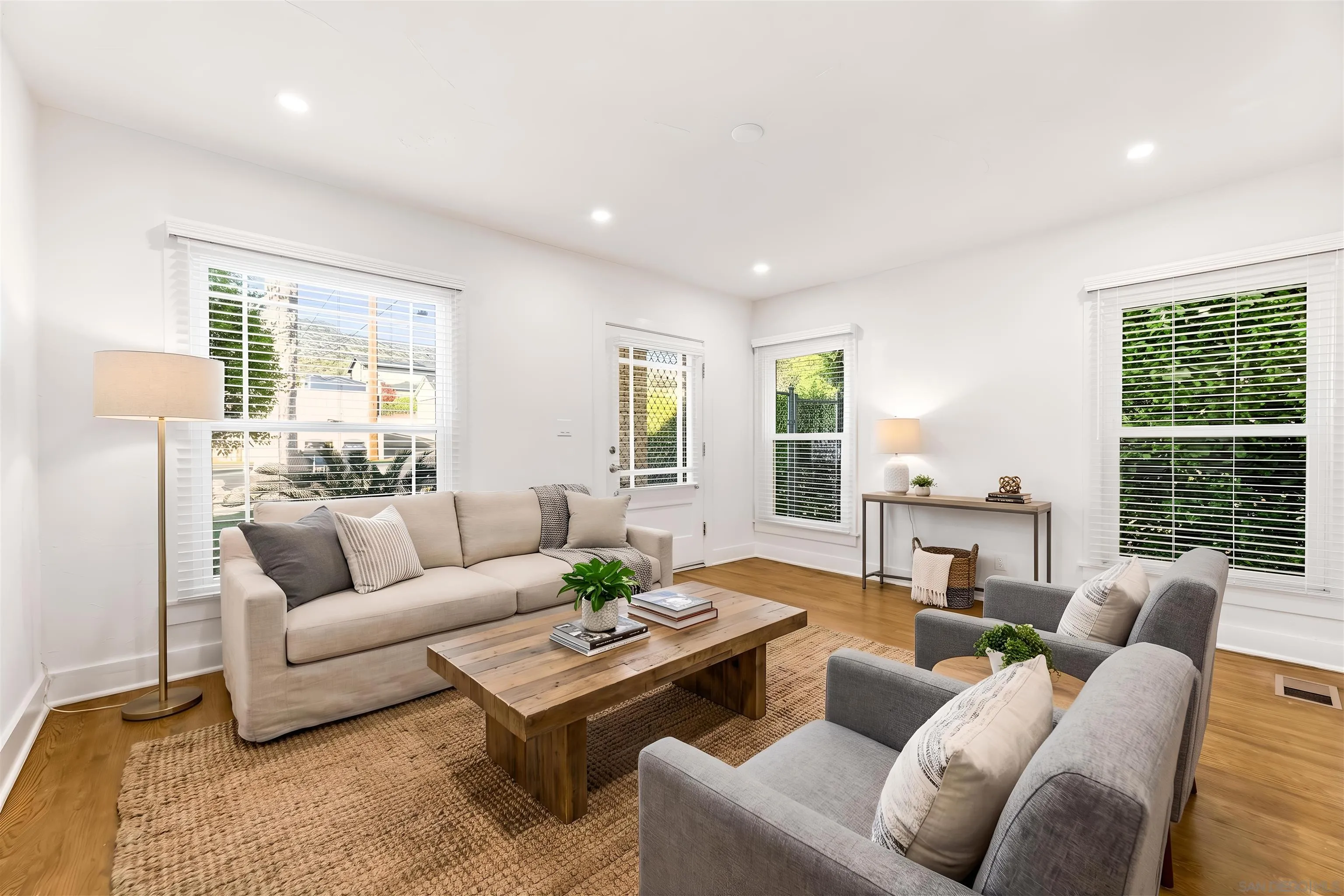 915 North Kenneth Road Burbank, CA 91501 - Photo 7 of 7 a living room with furniture and a large window