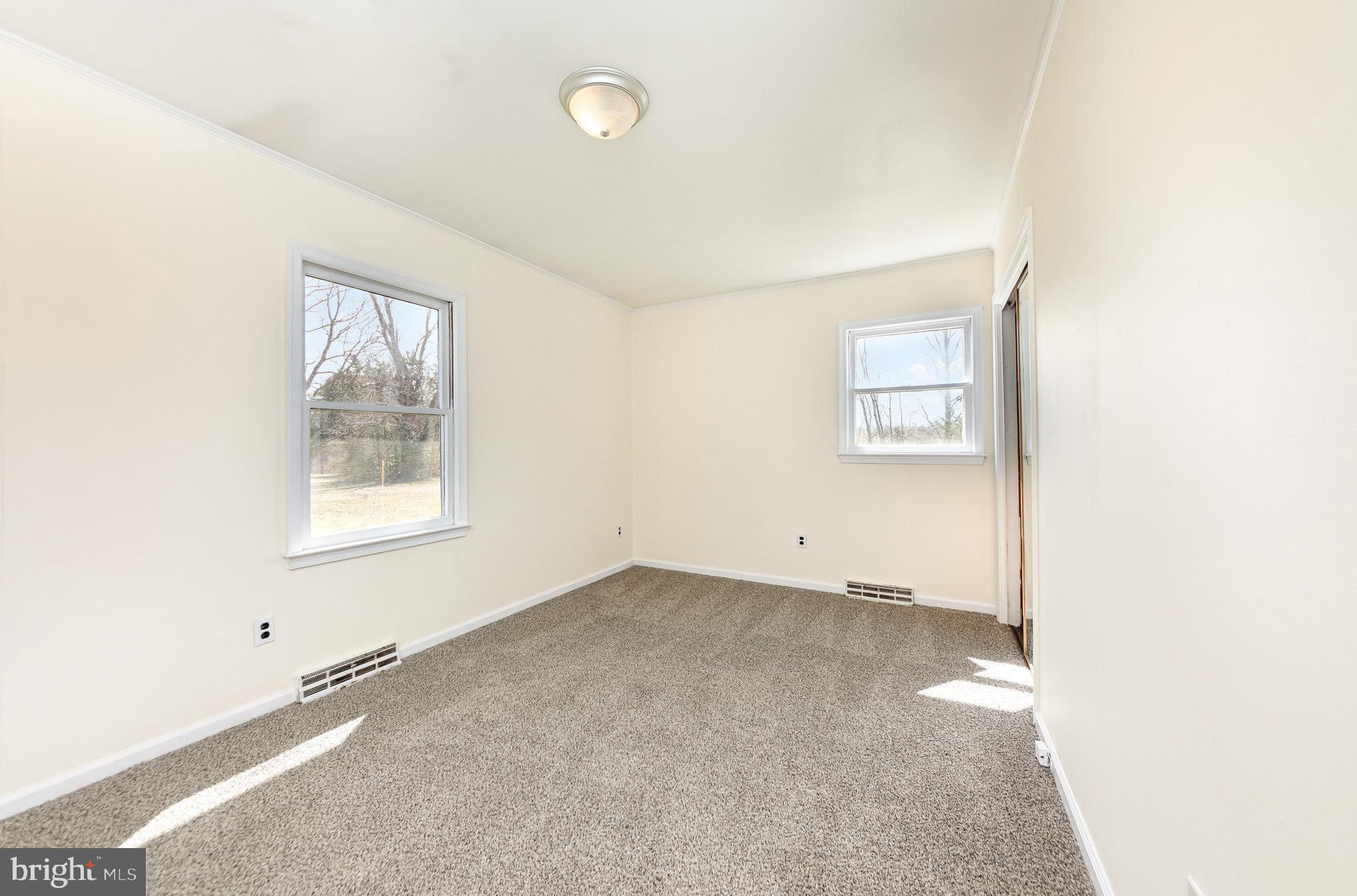 8430 Courthouse Road Spotsylvania, VA 22551 - Photo 15 of 23 an empty room with windows