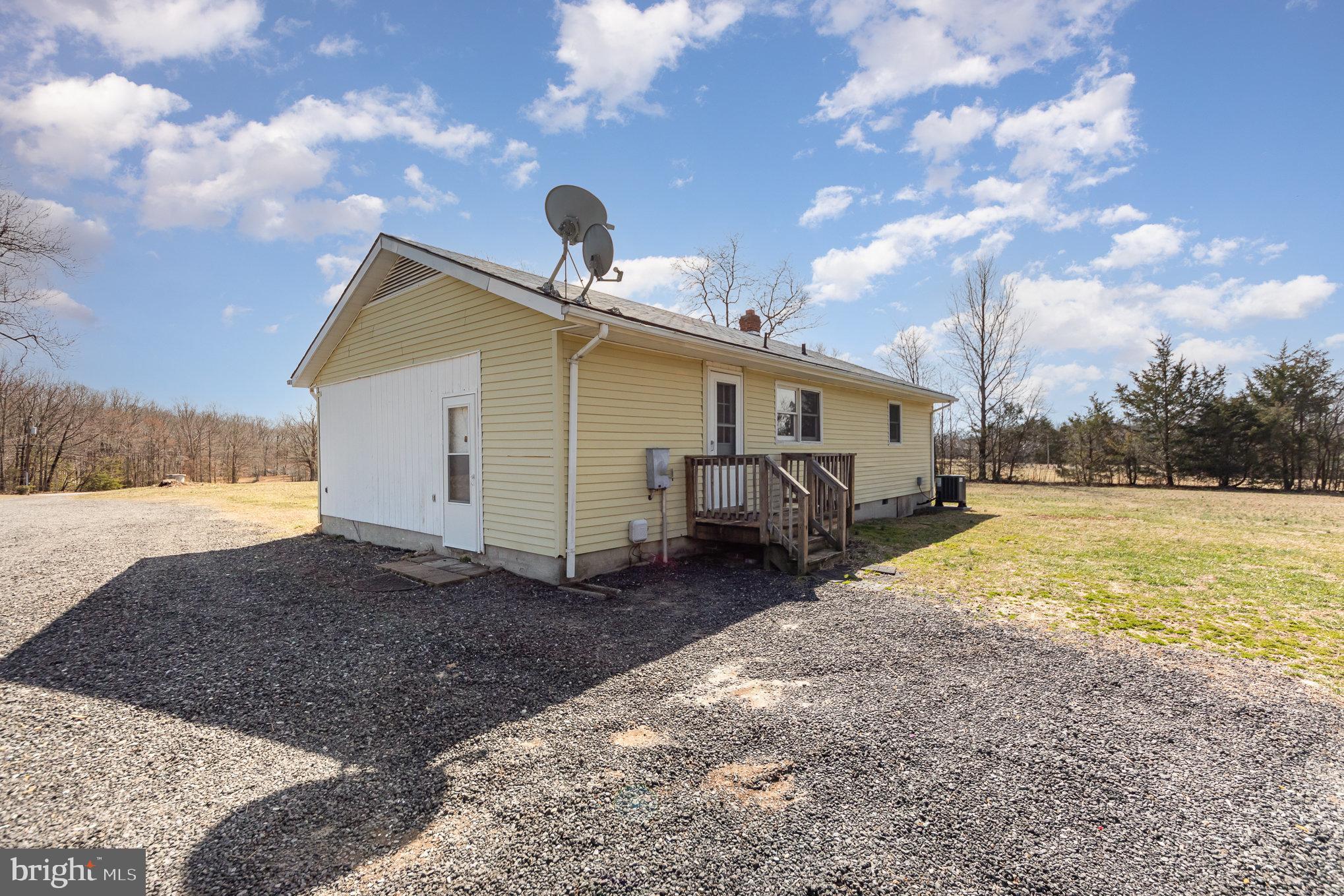 8430 Courthouse Road Spotsylvania, VA 22551 - Photo 20 of 23 a view of a house with backyard and a tree