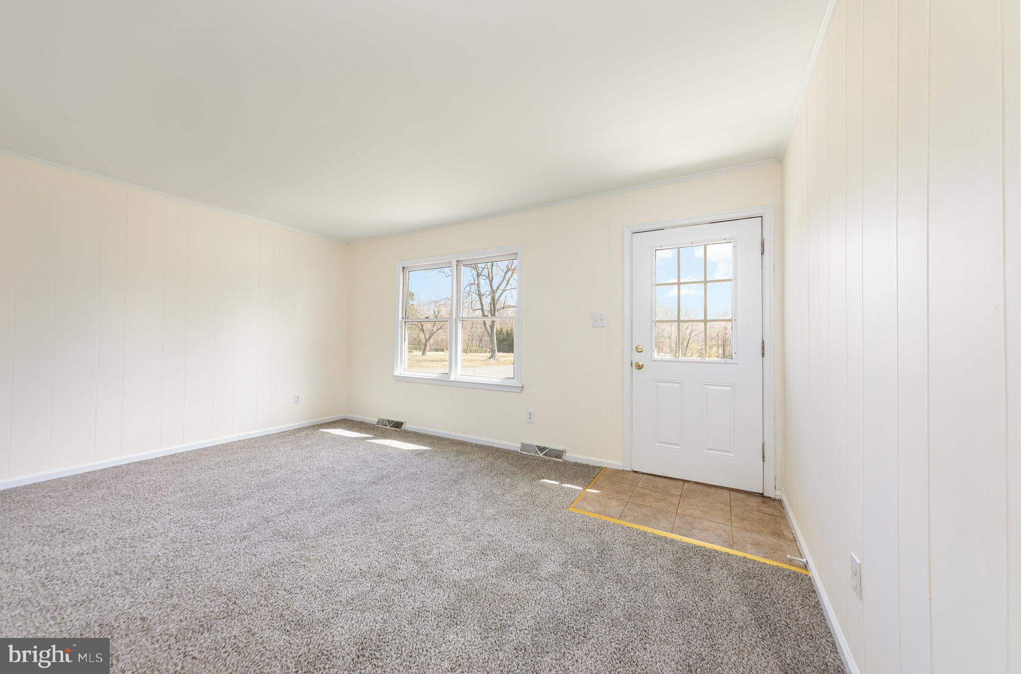 8430 Courthouse Road Spotsylvania, VA 22551 - Photo 4 of 23 an empty room with windows