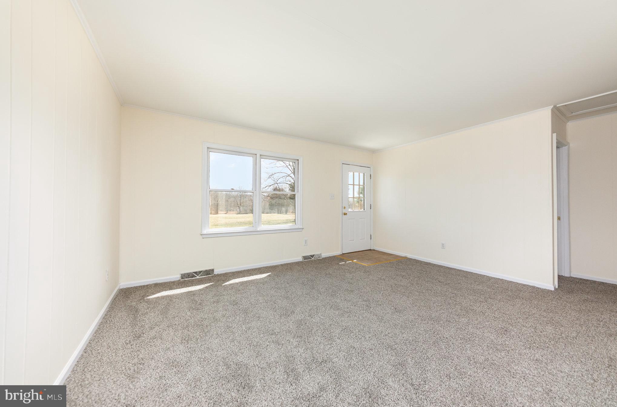 8430 Courthouse Road Spotsylvania, VA 22551 - Photo 5 of 23 an empty room with windows